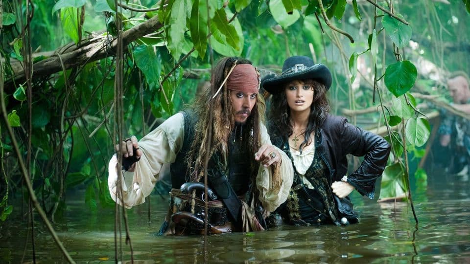 Johnny Depp and Penélope Cruz in water in Pirates of the Caribbean: On Stranger Tides.